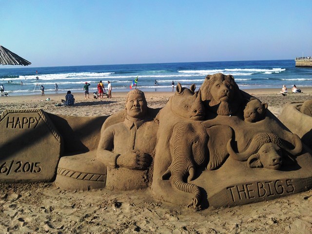 Sand sculptures. The artist asks for a donation to photograph them.